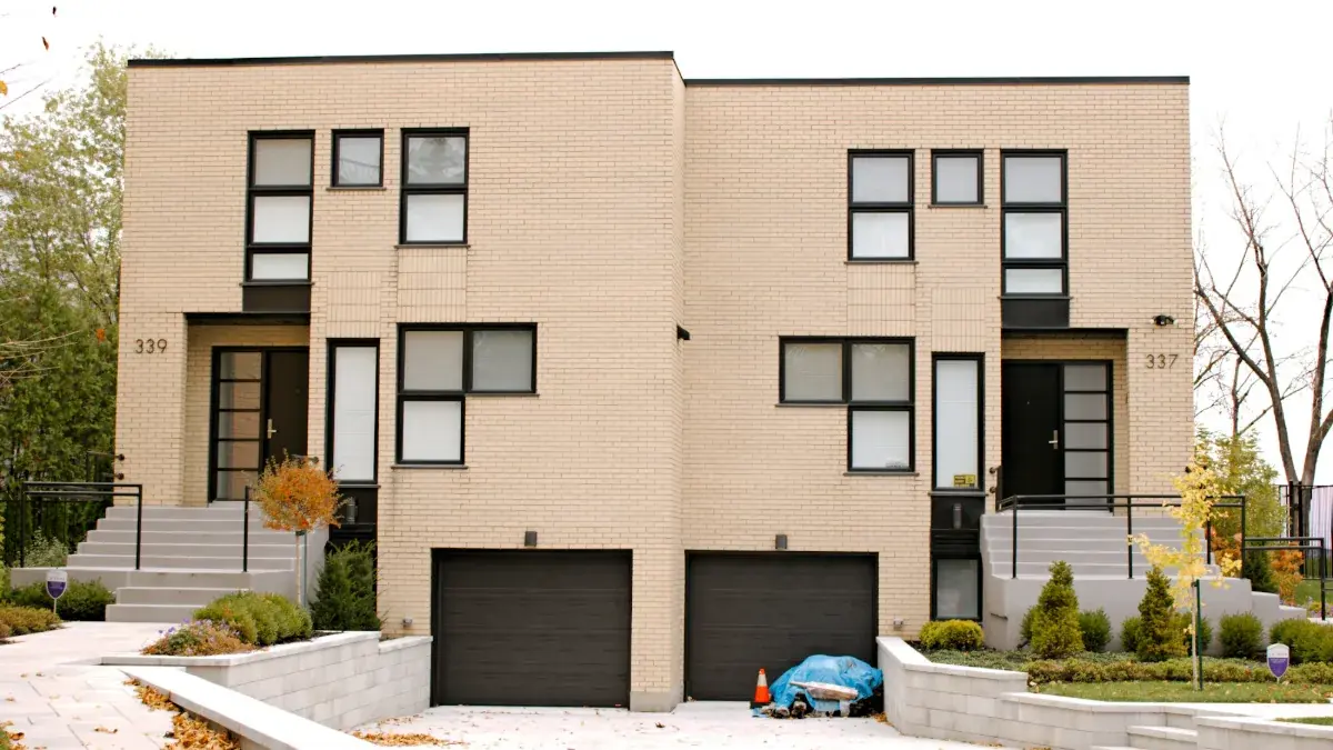 Modern duplex rental property with two garages